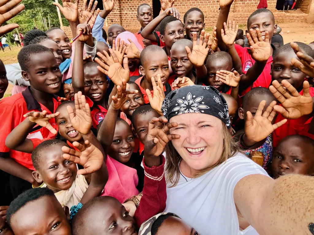 Leanne and the school children in Uganda